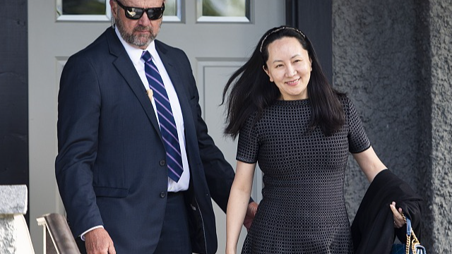 Meng Wanzhou, chief financial officer of Huawei Technologies Co., leaves her house for a hearing at the Supreme Court in Vancouver, British Columbia, Canada, May 8, 2019. /VCG