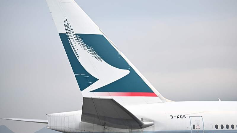 The Cathay Pacific logo is seen on the tail of a passenger plane as it prepares to take off from Hong Kong's international airport, March 13, 2019. /CFP