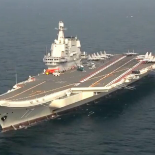 Chinese-built aircraft carrier undergoes sea trial - CGTN