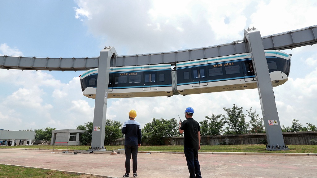 Wuhan 'sky train' successfully completes high temperature test run - CGTN