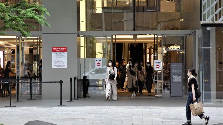 Japan's retail sales extend slump as virus curbs keep shoppers away - CGTN