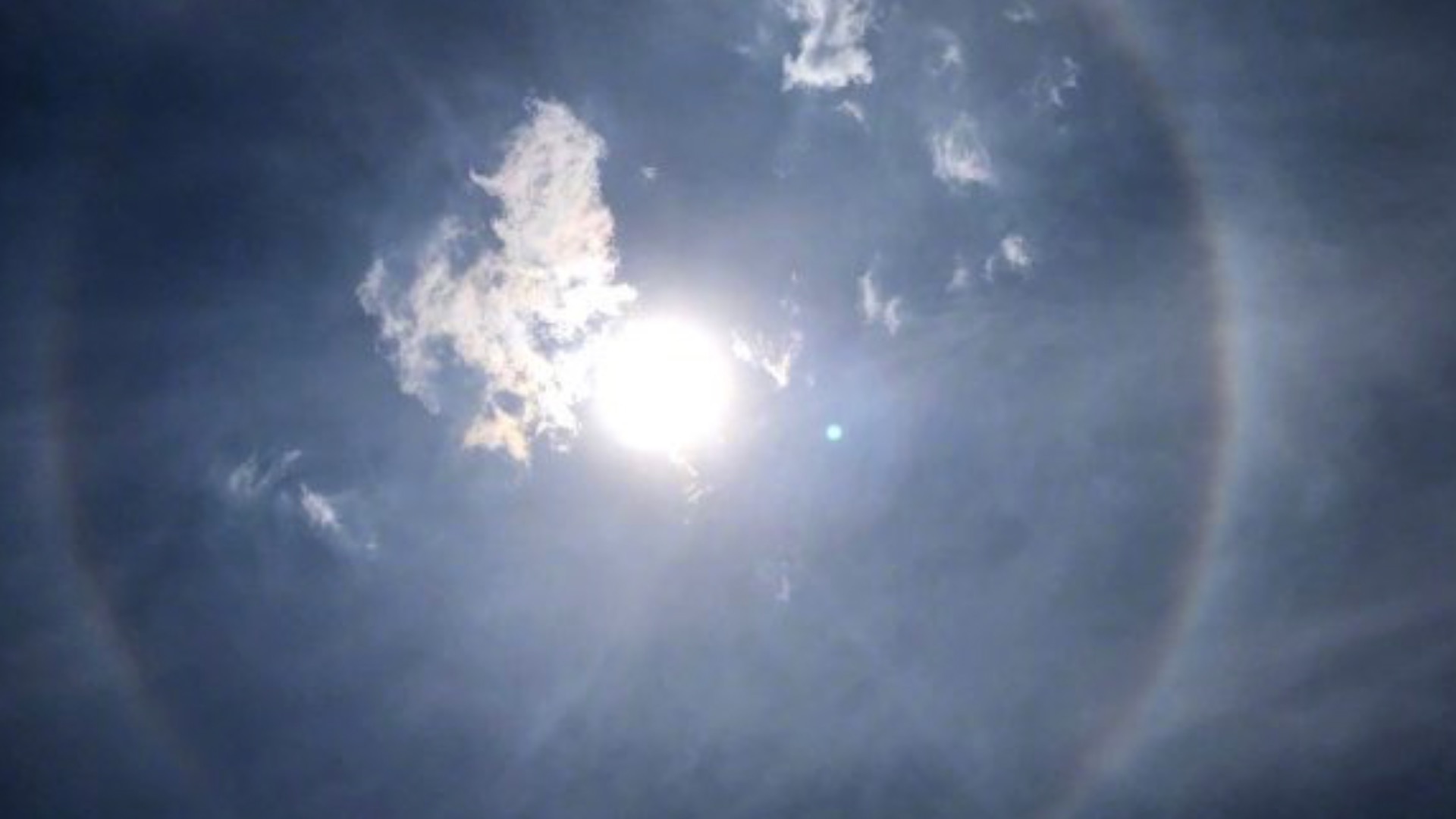 Rare spectacle in the sky: Aureole and rainbow spotted together - CGTN