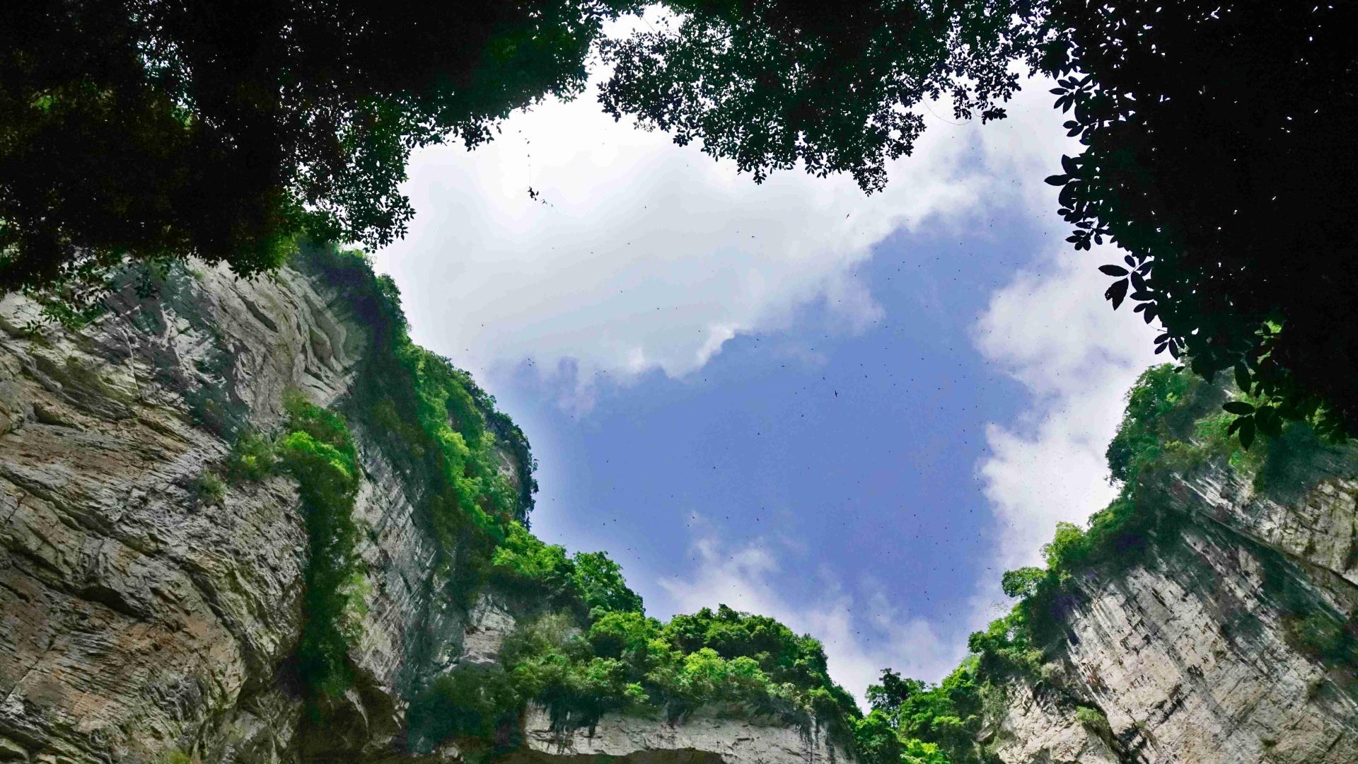 Explore The Waterfall Hidden In The Karst Sinkhole In SW China - CGTN