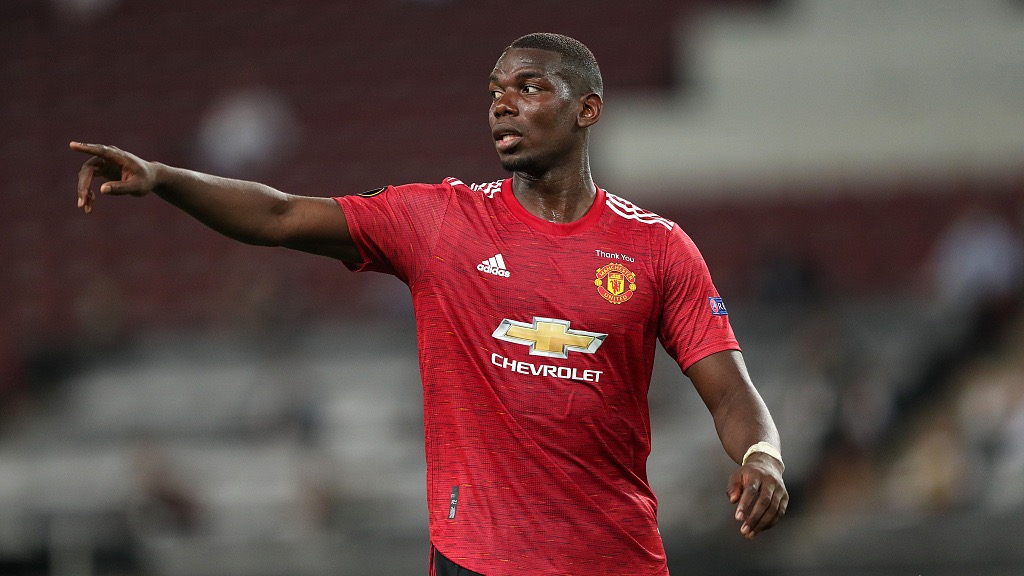 Paul Pogba to stay at Man United this summer, says agent Mino ...