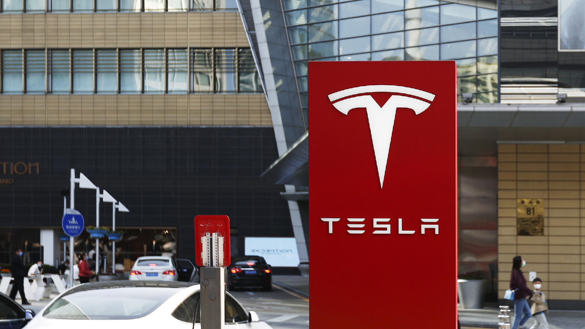 Tesla reports record revenue, profit doubles as car deliveries surge - CGTN