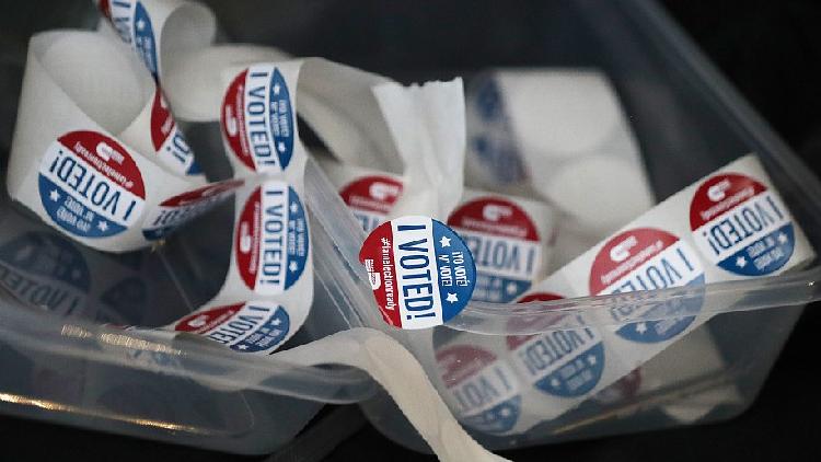 U.S. voters in China: Juggling ballots, envelopes and anxiety