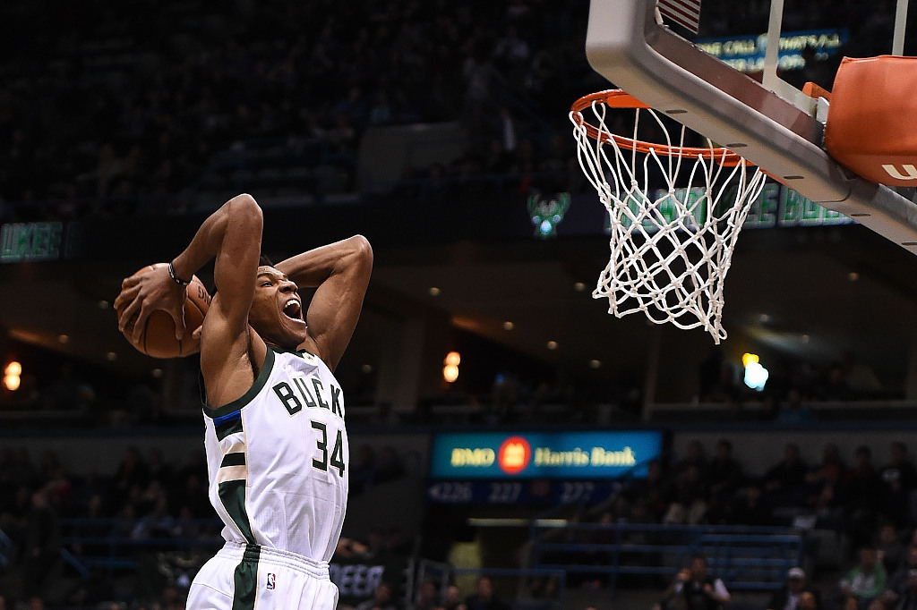 NBA MVP Giannis Antetokounmpo agrees to reported $228m extension with Bucks, Milwaukee Bucks