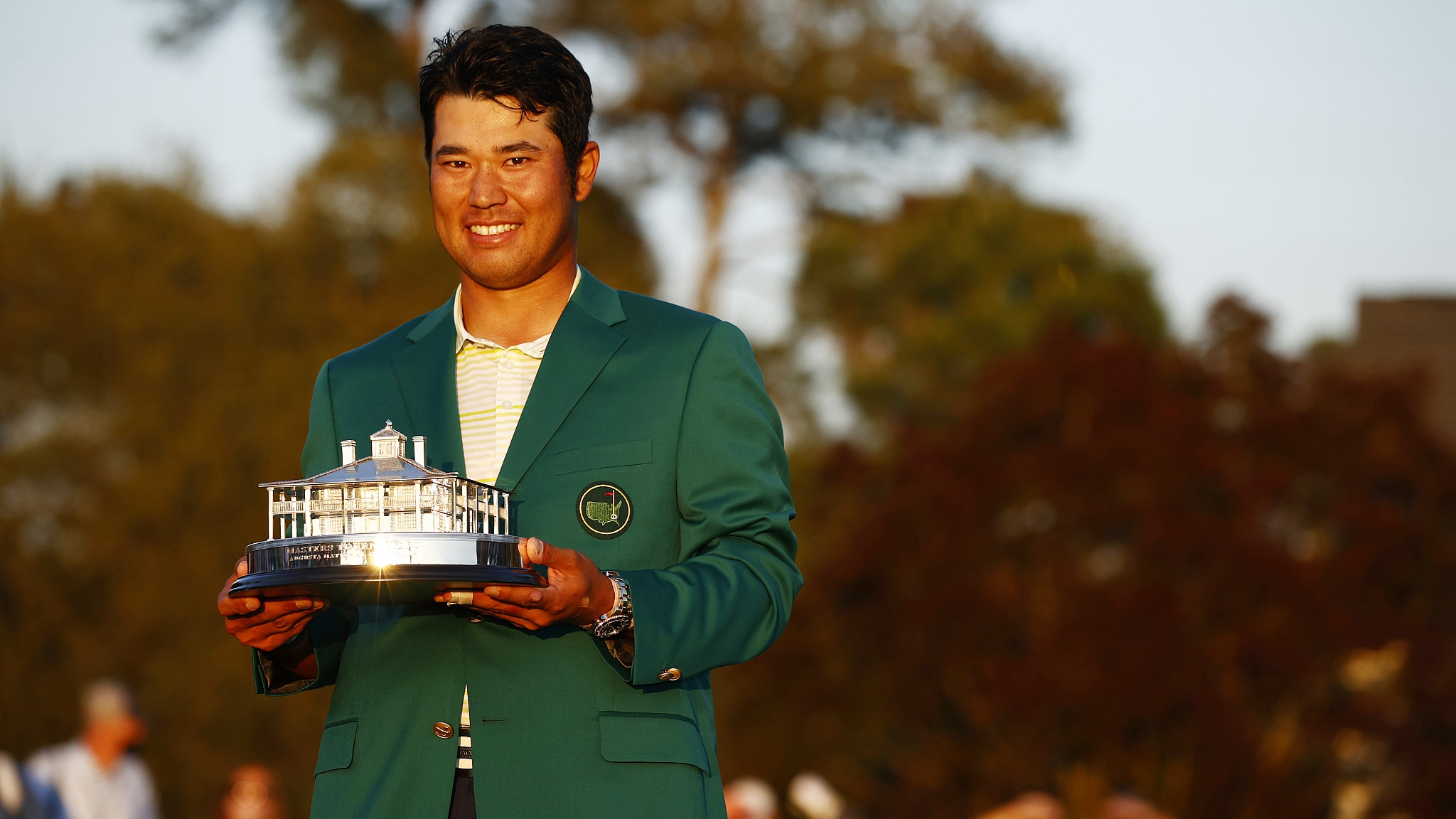 Matsuyama makes history as first Asian-born player to win golf major - CGTN