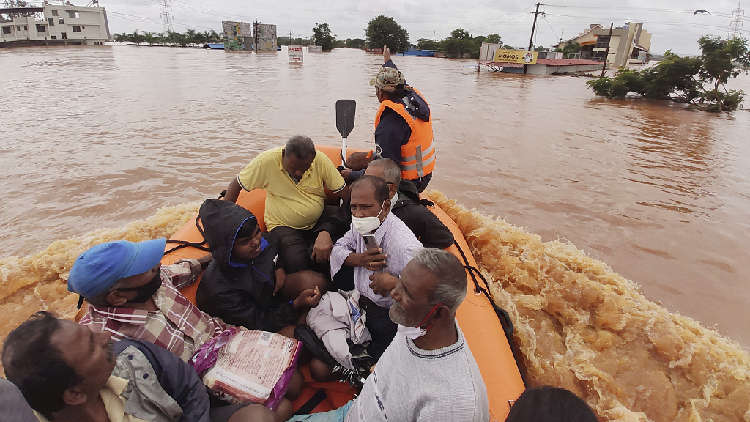 Floods and landslides triggered by heavy rains kill over 100 in India ...