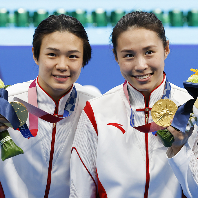 Shi Tingmao/Wang Han take China's 1st diving gold at Tokyo Olympics - CGTN