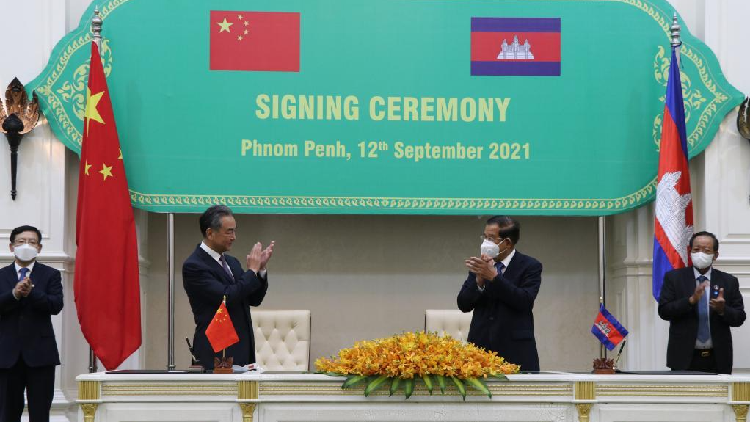 China, Cambodia vow to boost cooperation in trade, fighting COVID-19 - CGTN