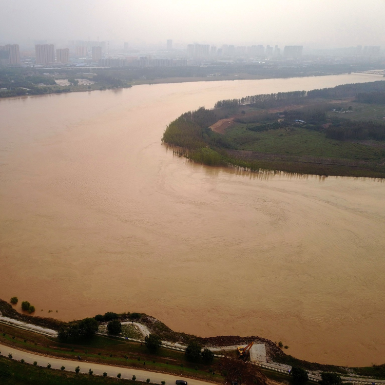 Expert Colliding warm, cold air cause of Yellow River's fierce floods