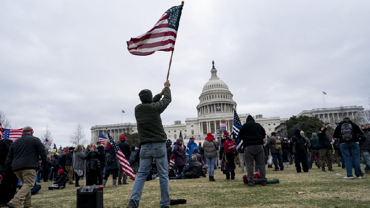 China points out 'deep-seated problems' with U.S. democracy in report ...