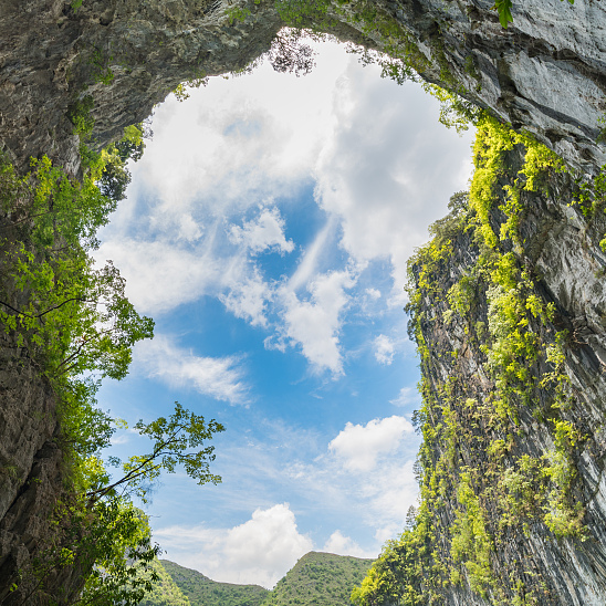 Live: Enjoy splendid view of giant sinkhole in Guangxi - CGTN