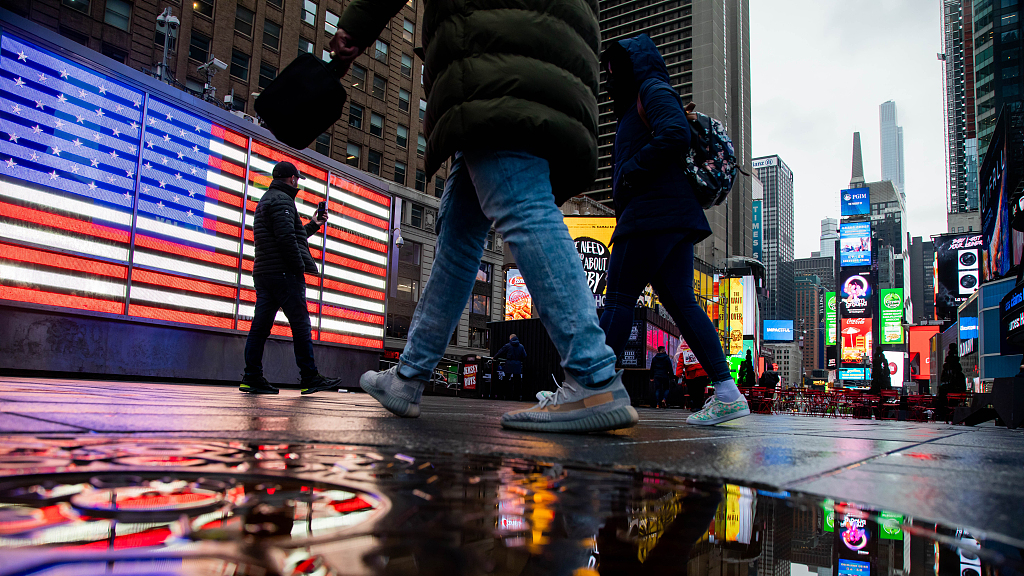 Pedestrians in Times Square near the Nasdaq Market Site in New York, U.S., February 3, 2022. /CFP