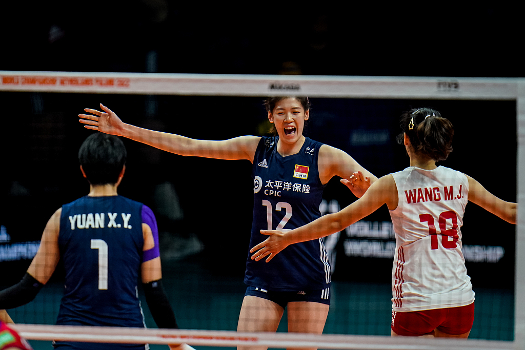 Players of China celebrate after scoring in the FIVB Women's Volleyball World Championship match against Japan in Arnhem, Netherlands, September 28, 2022. /CFP