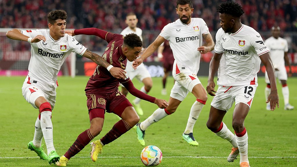Bayern Munich and Bayer Leverkusen players in action during a Bundesliga match in Munich, Germany, September 30, 2022. /CFP
