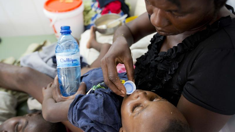 A boy diagnosed with cholera receives treatment at a cholera center in Anse D'Hainault, Haiti, October 11, 2016. /AP