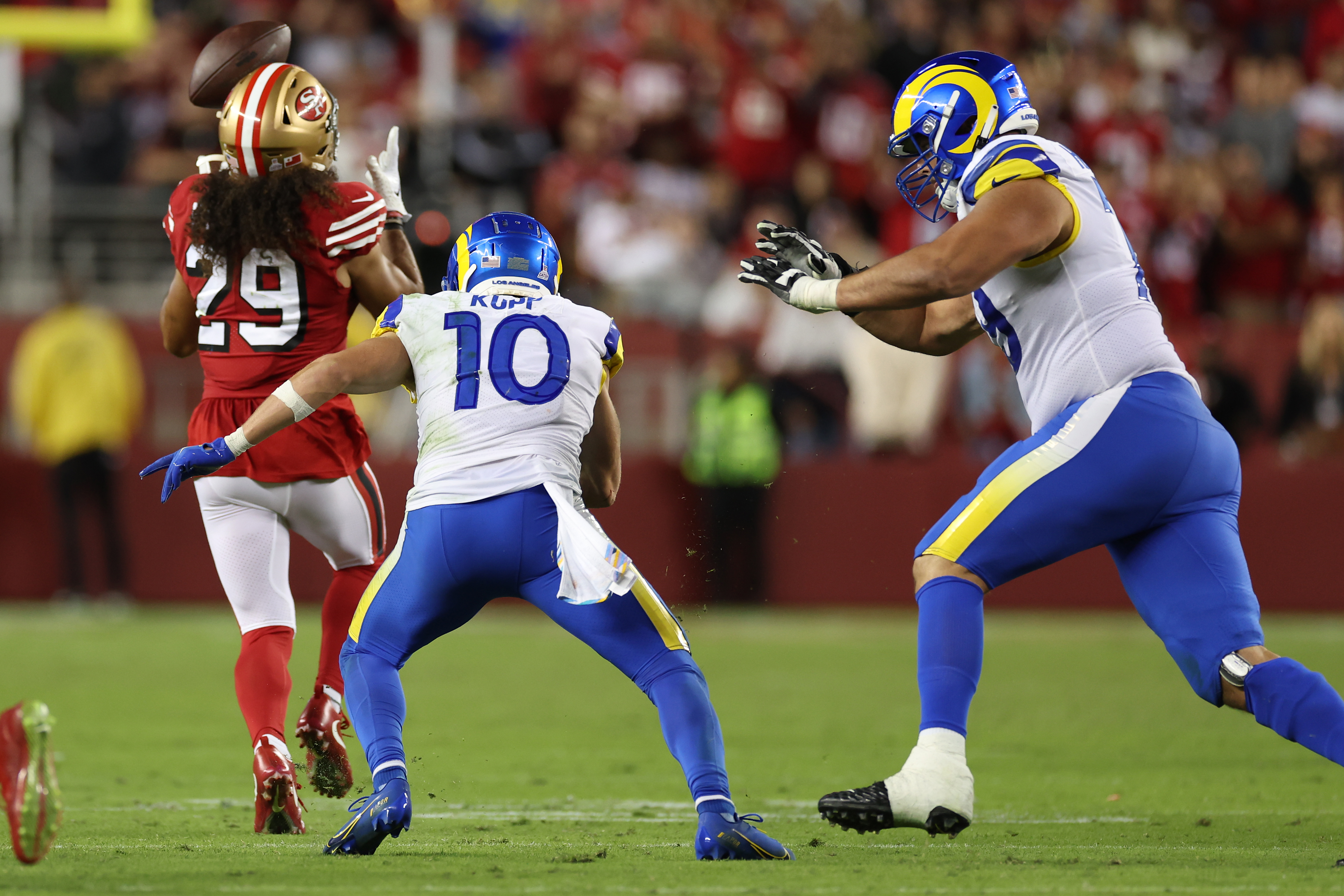 Safety Talanoa Hufanga (#29) of the San Francisco 49ers intercepts a pass by quarterback Matthew Stafford of the Los Angeles Rams before returning it for a touchdown in the game at Levi's Stadium in Santa Clara, California, October 3, 2022. /CFP