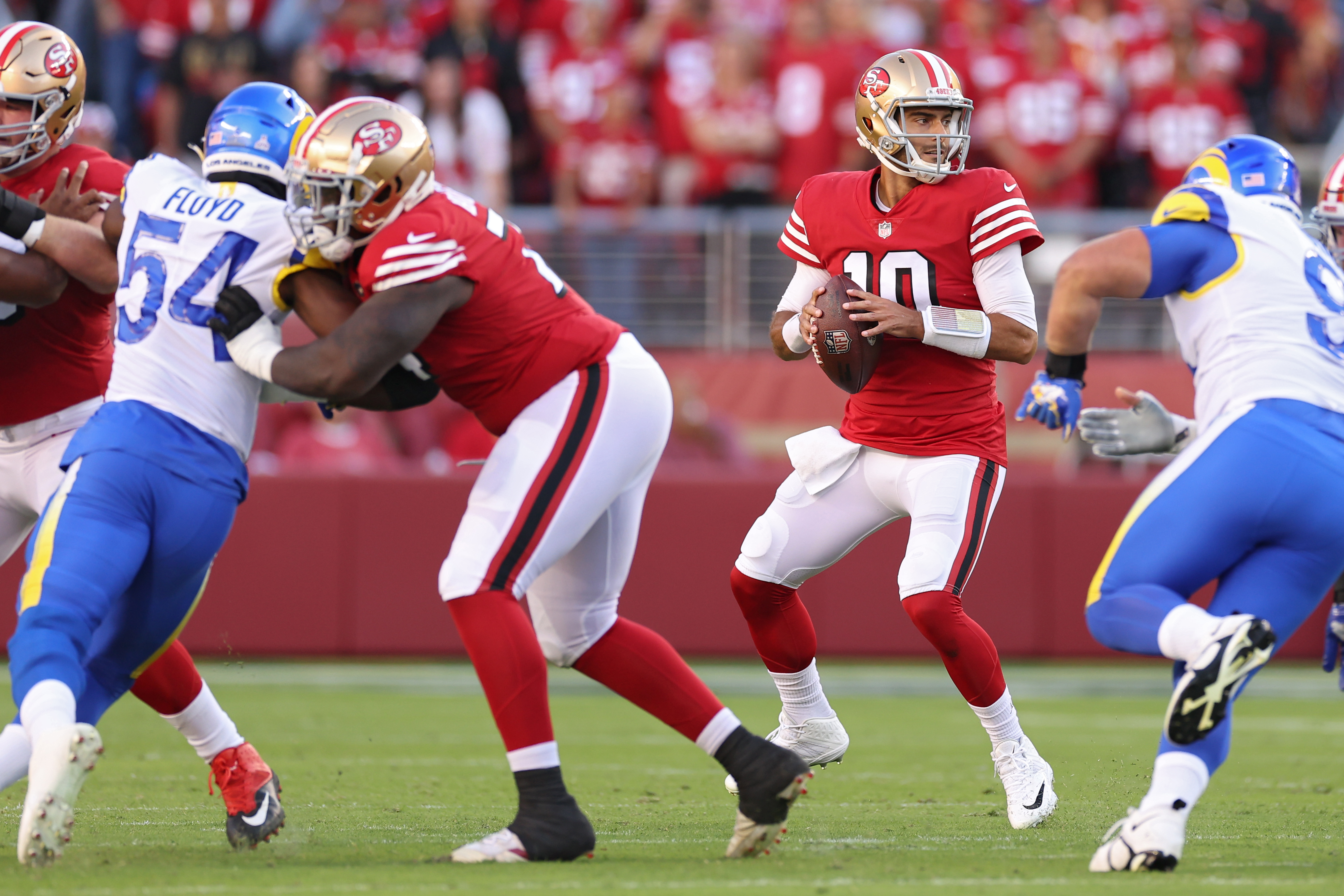 Quarterback Jimmy Garoppolo (#10) of the San Francisco 49ers looks to pass in the game against the Los Angeles Rams at Levi's Stadium in Santa Clara, California, October 3, 2022. /CFP
