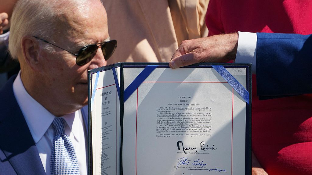 H.R.4346, the CHIPS and Science Act of 2022, is displayed after it was signed by U.S. President Joe Biden on the South Lawn of the White House in Washington, D.C., U.S., August 9, 2022. /CFP