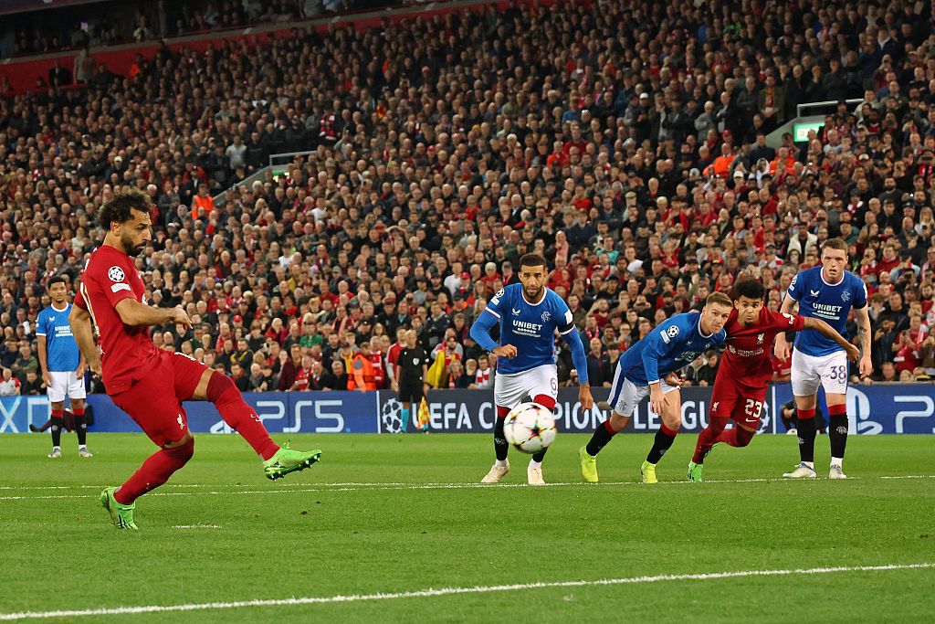 Mohamed Salah scores Liverpool's second goal from the penalty spot during the UEFA Champions League group match between Liverpool FC and Rangers FC at Anfield in Liverpool, England, October 4, 2022. /CFP