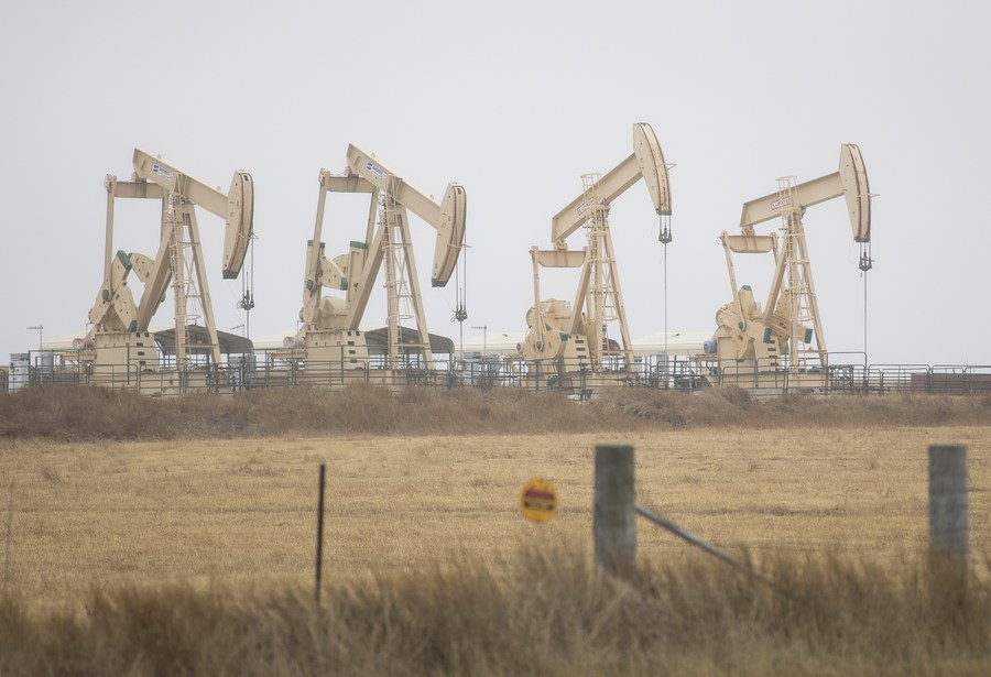 Oil derricks operate in Three Rivers, Texas, the United States, February 24, 2022. /Xinhua