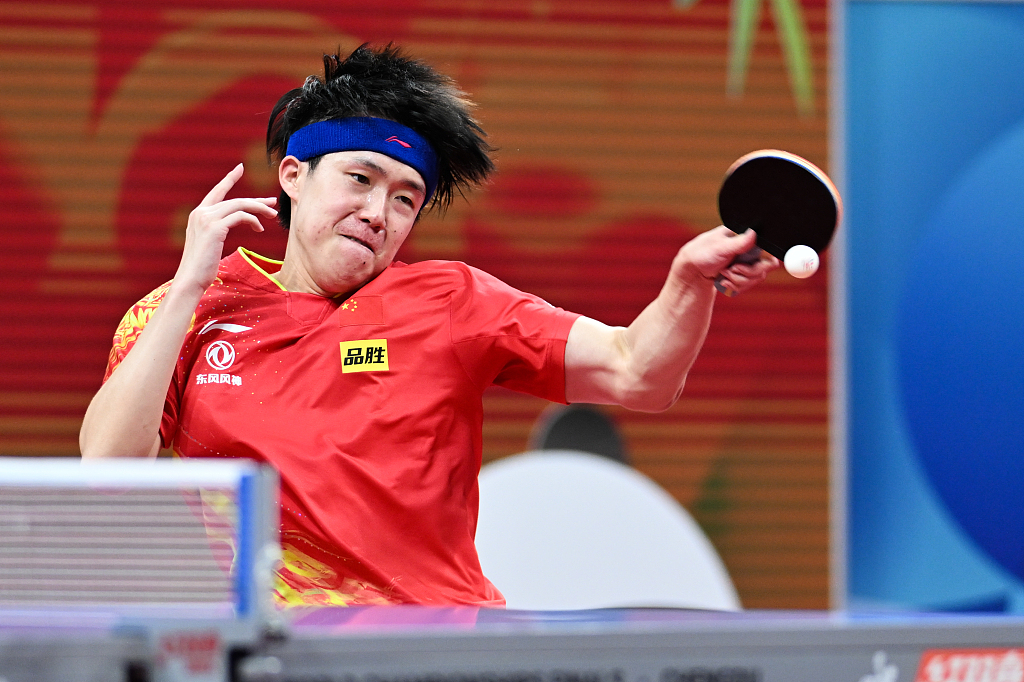 Wang Chuqin of China competes in the World Team Table Tennis Championships Men's quarterfinals match against Kristian Karlsson of Sweden in Chengdu, southwest China's Sichuan Province, October 7, 2022. /CFP