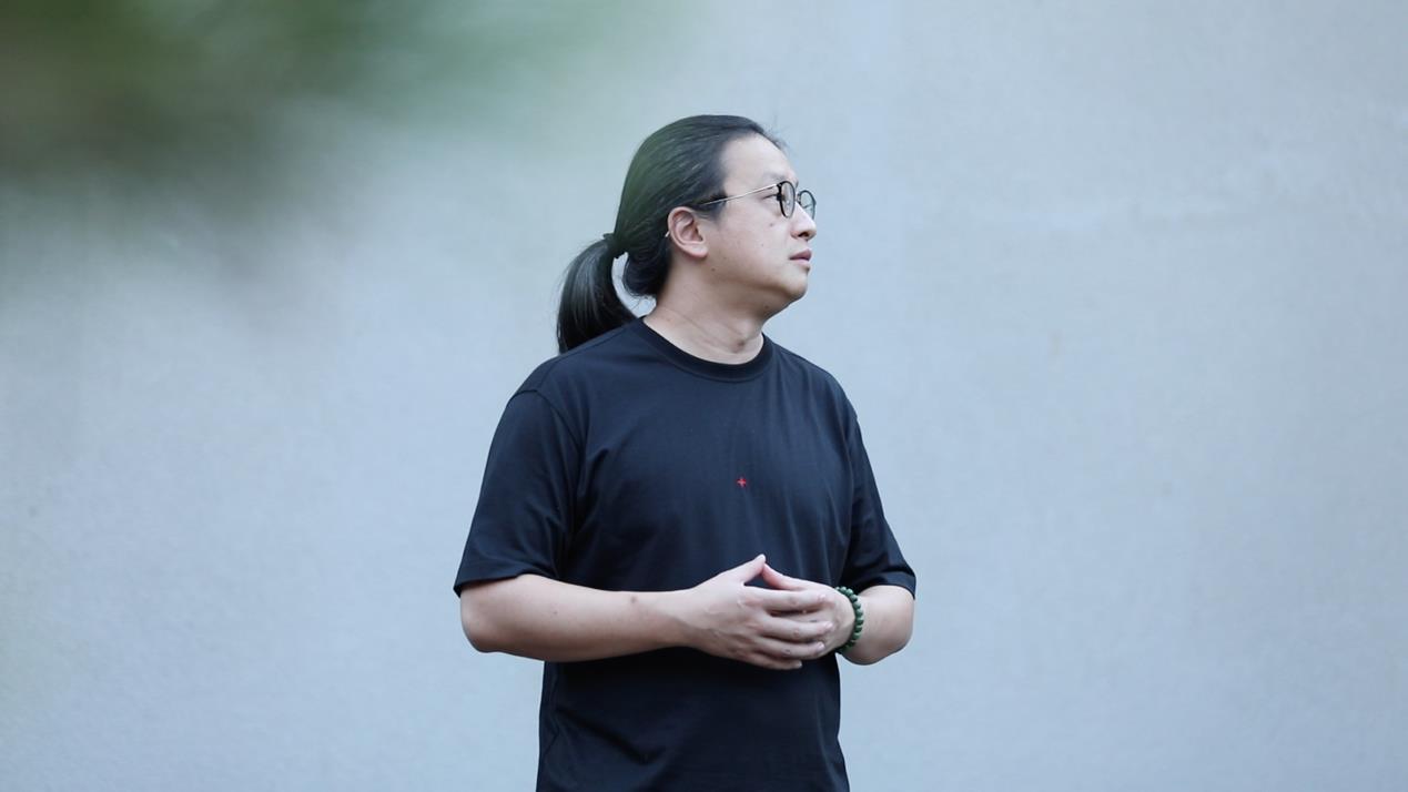 Wang Zhiou, a multimedia artist.  /CGTN