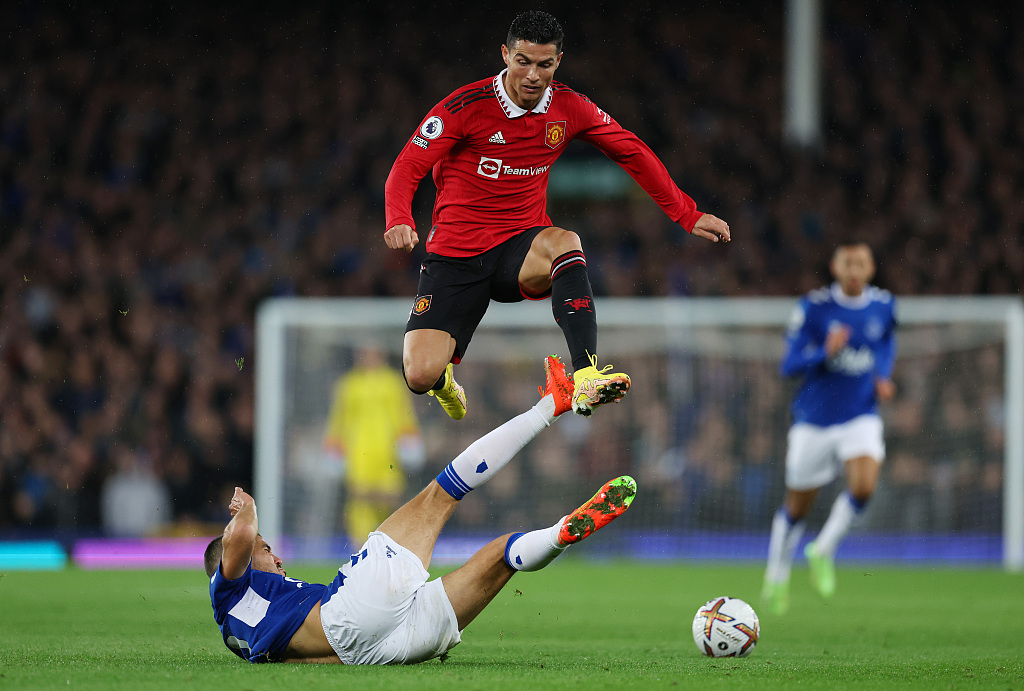 Cristiano Ronaldo of Manchester United is challenged by Conor Coady of Everton during the clash at Goodison Park, Liverpool, England, October 9, 2022. /CFP