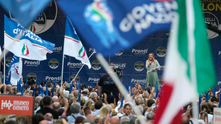 Right-wing party Brothers of Italy's leader Giorgia Meloni, center-right on stage, addresses a rally as she starts her political campaign ahead of Sept. 25 general elections, in Ancona, Italy, Tuesday, Aug. 23, 2022. /AP