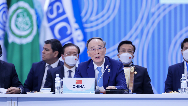 Chinese Vice President Wang Qishan (C) addresses the sixth CICA summit in Astana, Kazakhstan, October 13, 2022. /Xinhua