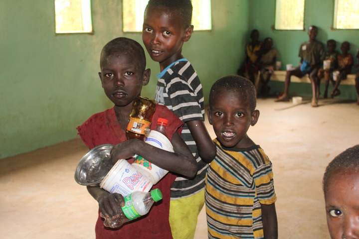 Children wait for food in Samburu County, Kenya, March 30, 2022. /Xinhua