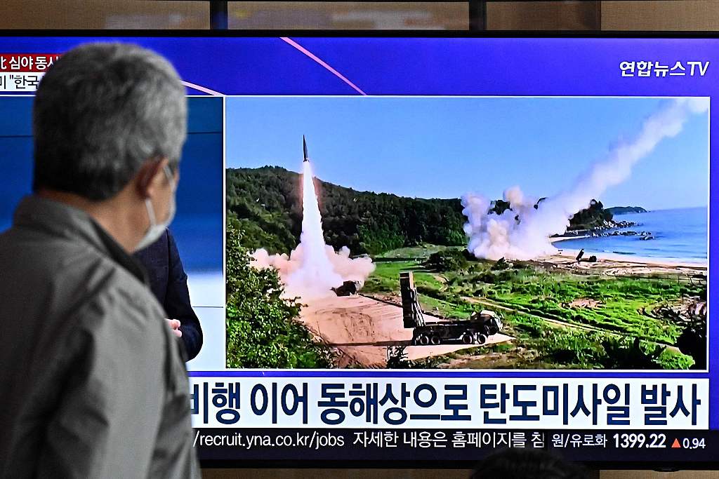 On October 14, 2022, at a local train station in Seoul, South Korea, a man saw an image of North Korea's missile test broadcast on television.  /PPP