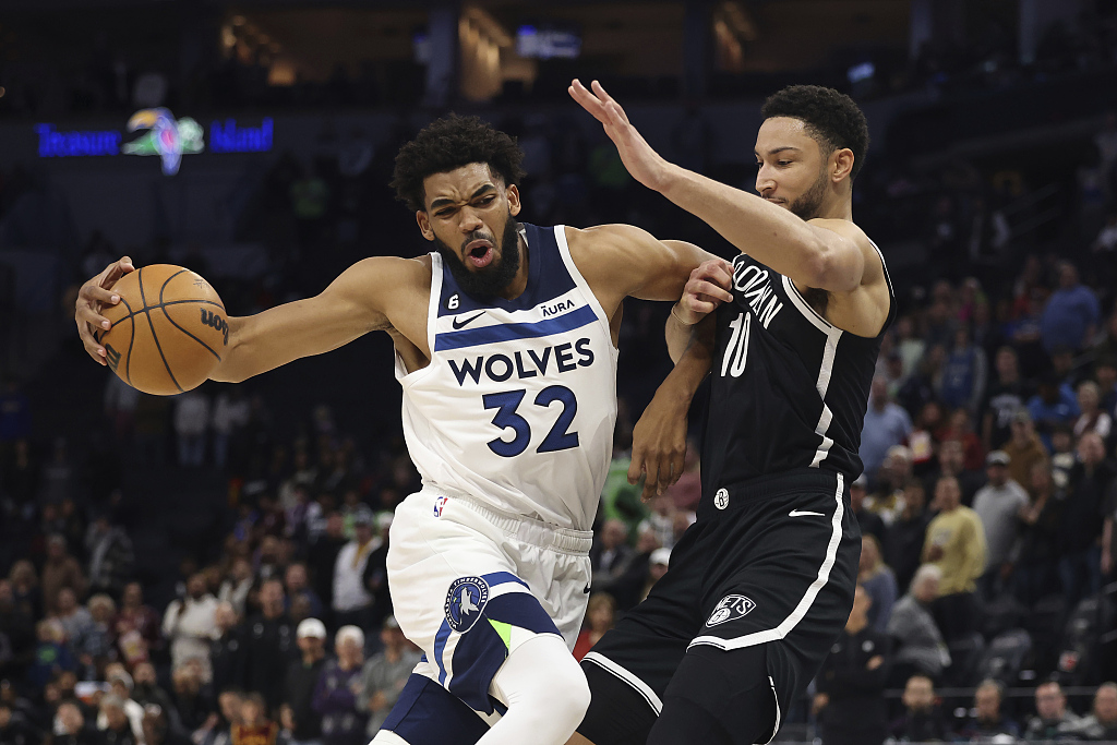 Ben Simmons (#10) of the Brooklyn Nets guards Karl-Anthony Towns of the Minnesota Timberwolves in the NBA pre-season game at Target Center in Minneapolis, Minnesota, October 14, 2022. /CFP