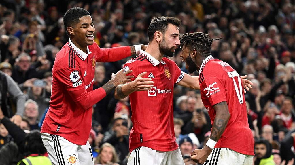 Manchester United players celebrate during the Premier League match against Tottenham Hotspur in Manchester, UK, October 19, 2022. /CFP