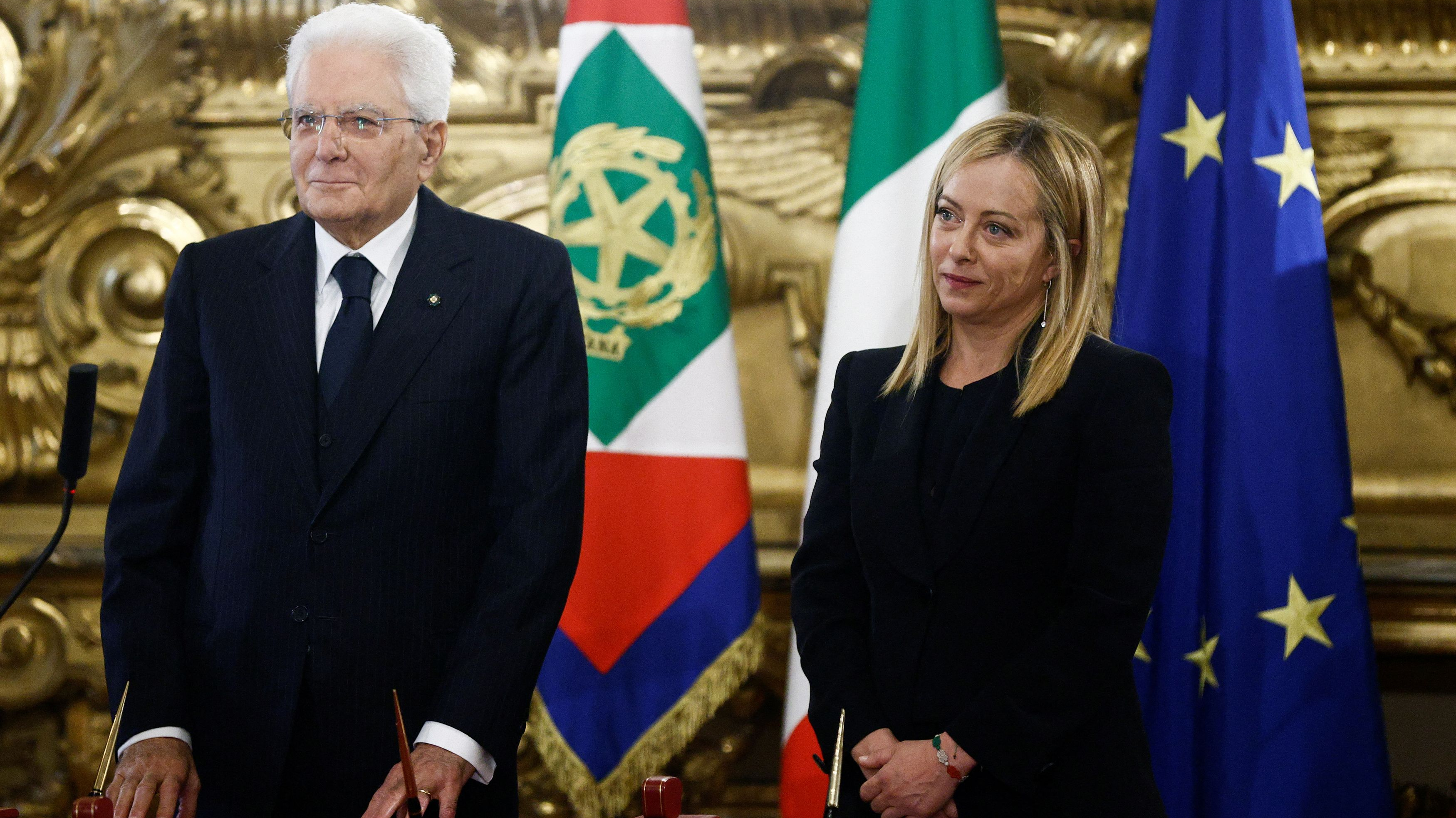 Italy's newly elected Prime Minister Giorgia Meloni (R) and Italian President Sergio Mattarella attend the swearing-in ceremony at the Quirinale Presidential Palace, Rome, Italy, October 22, 2022./ Reuters