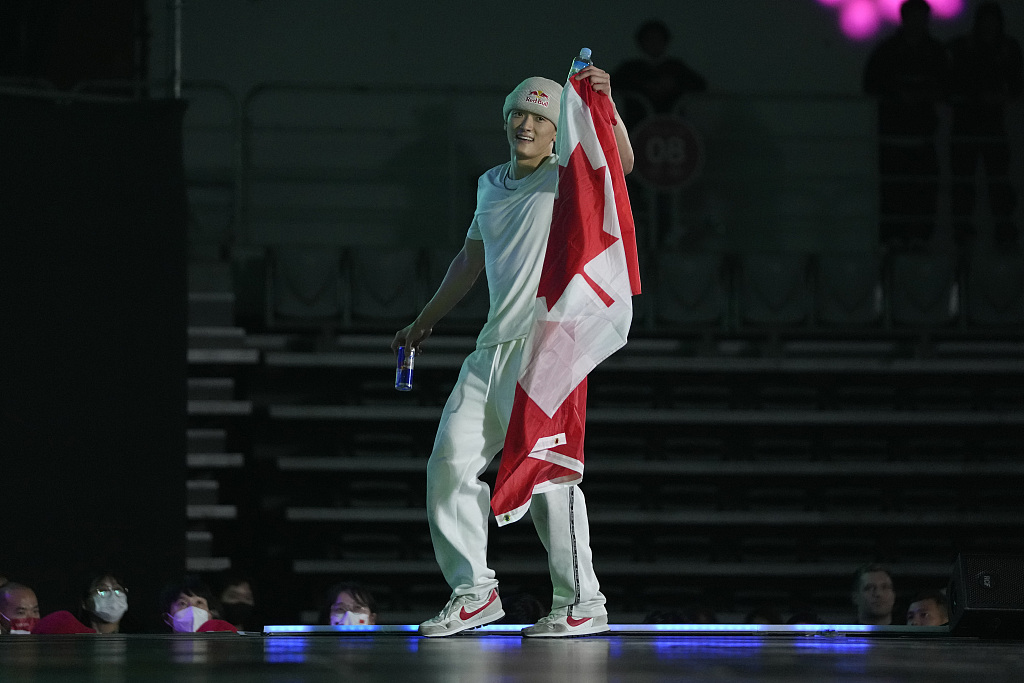 Philip Kim of Canada, known as B-Boy Phil Wizard, celebrates after winning the men's title during the WDSF World Breaking Championship in Seoul, the Republic of Korea, October 22, 2022. /CFP