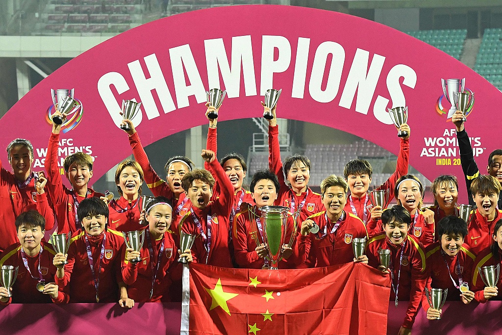 Players of China celebrate after winning the Asian Football Confederation Women's Asian Cup championship in Navi Mumbai, India, February 6, 2022. /CFP
