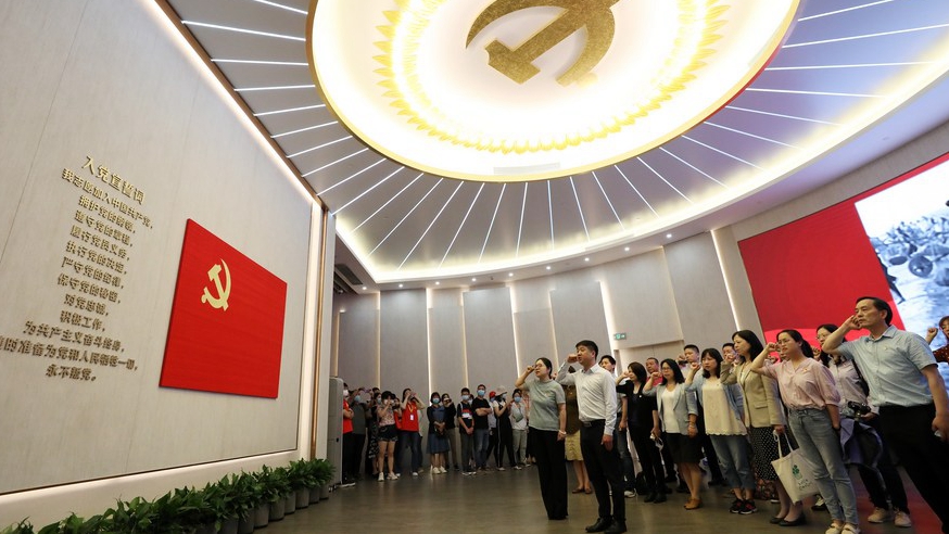 Members of the Communist Party of China (CPC) review the Party admission oath at the memorial of the First National Congress of the CPC in east China's Shanghai, June 3, 2021. /Xinhua