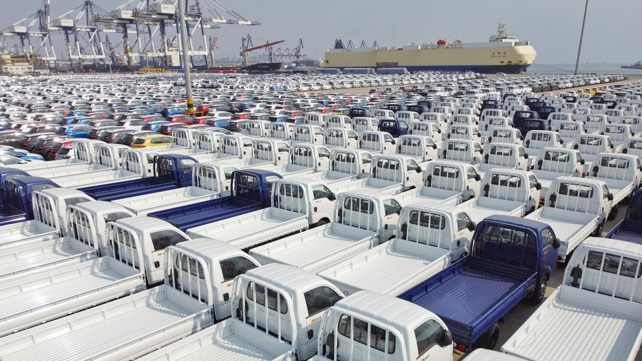 Vehicles to be loaded onto a freight ship at Yantai Port, east China's Shandong Province, March 7, 2022. /Xinhua