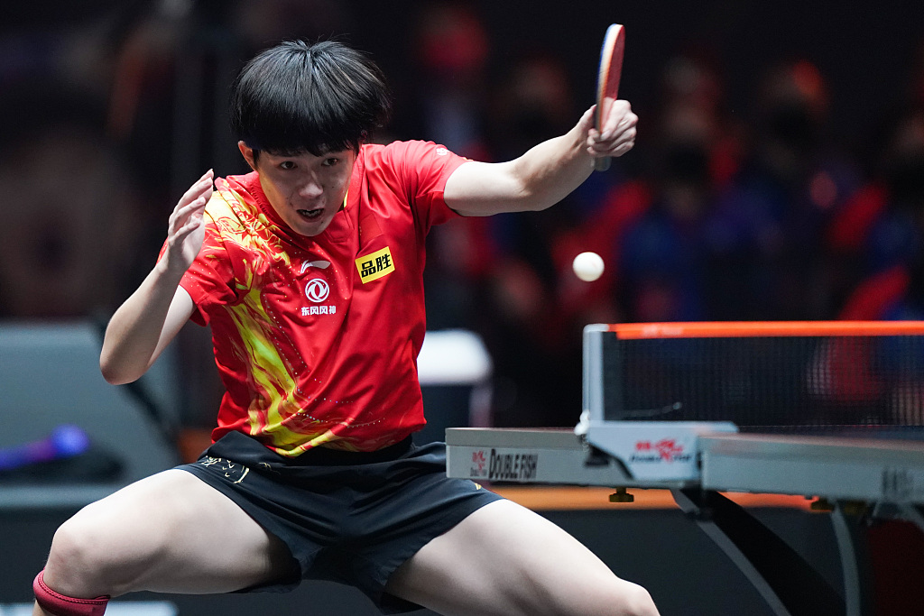 Wang Chuqin of China competes in the men's singles final match against Tomokazu Harimoto of Japan at the World Table Tennis (WTT) Cup Finals in Xinxiang, central China's Henan Province, October 30, 2022. /CFP