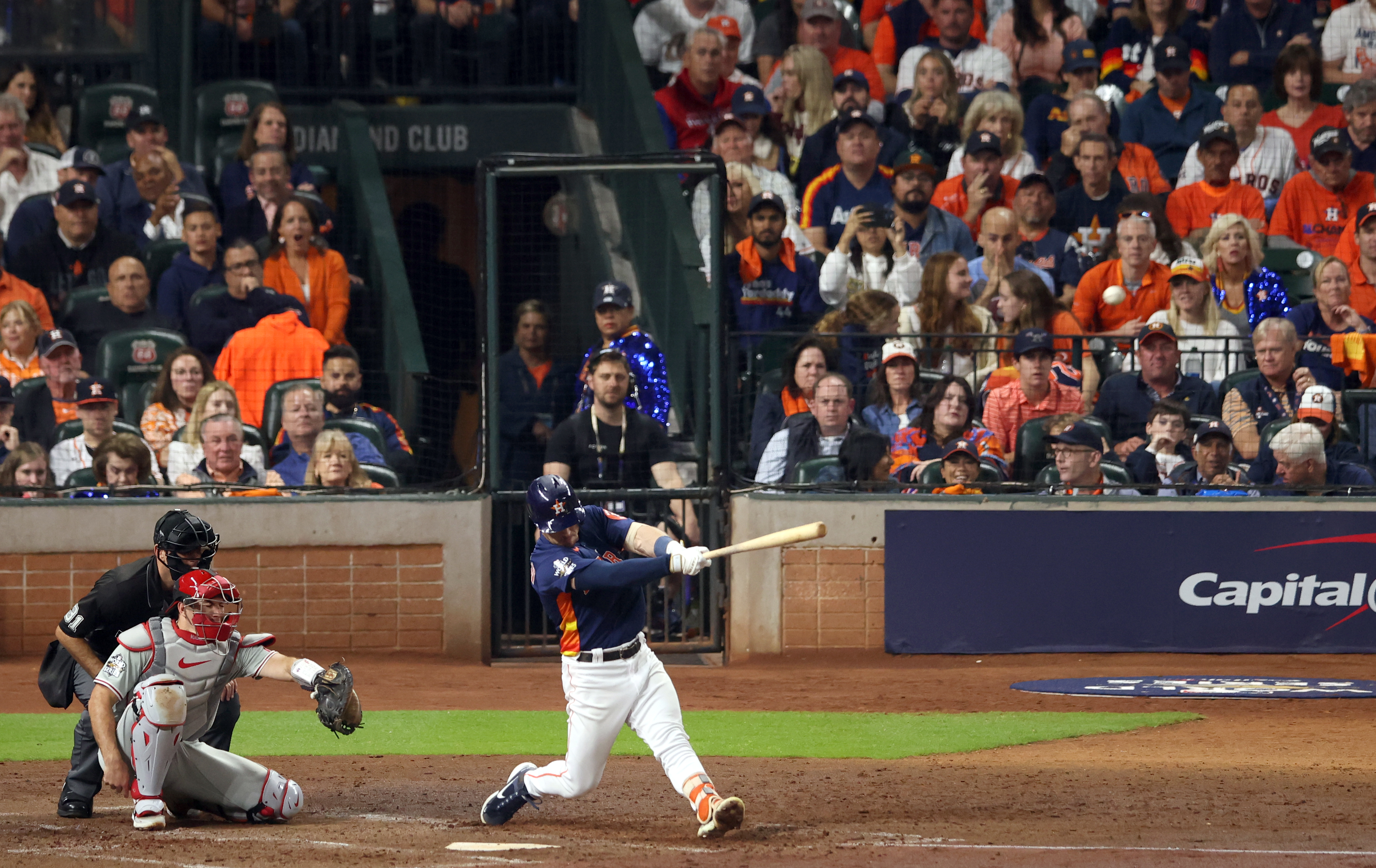Alex Bregman (R) of the Houston Astros hits a two-run homer during the fifth inning in Game 2 of the MLB World Series against the Philadelphia Phillies at Minute Mai Park in Houston, Texas, October 29, 2022. /CFP