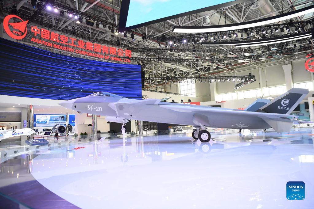 A model of the J-20 stealth fighter jet displayed at the pavilion of Aviation Industry Corporation of China, Ltd. at the 13th China International Aviation and Aerospace Exhibition, in Zhuhai, south China's Guangdong Province, September 27, 2021. /Xinhua