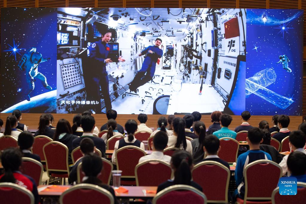 Students attend a live class given by the Shenzhou-13 crew members, in the Macao Special Administrative Region, China, December 9, 2021. /Xinhua