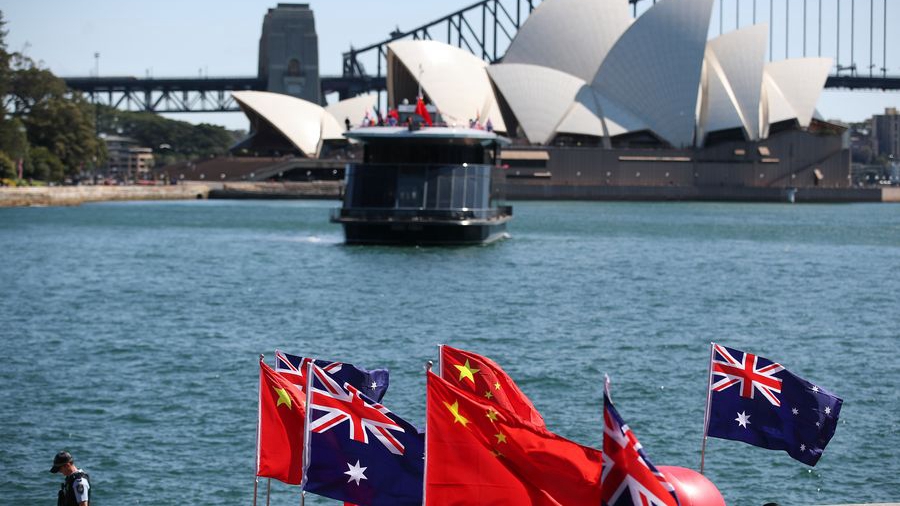 The Chinese and Australian national flags on a celebration event in Sydney, Australia, September 8, 2019. /Xinhua