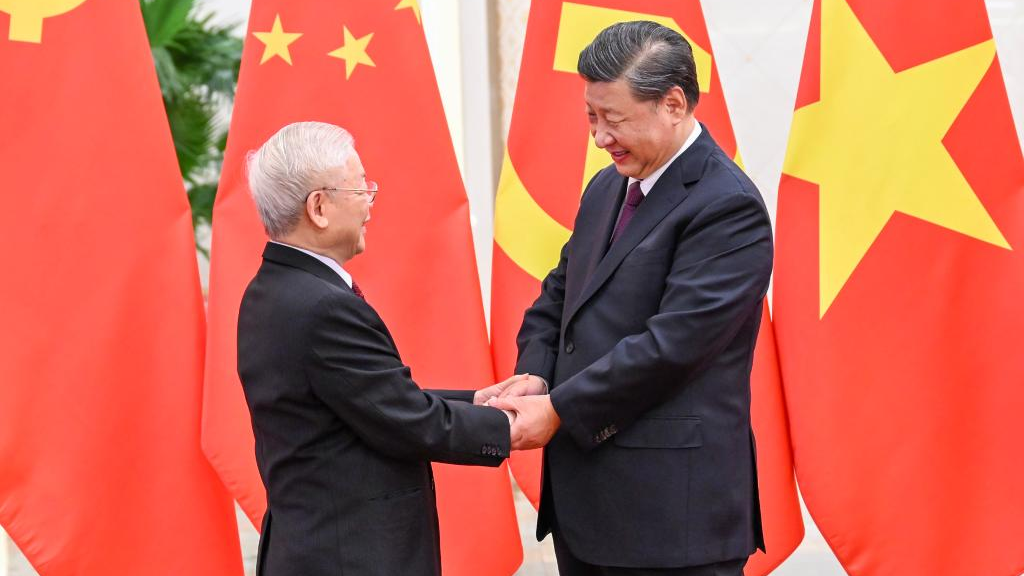 Xi Jinping, general secretary of the CPC Central Committee and Chinese president, welcomes Nguyen Phu Trong, general secretary of the Communist Party of Vietnam Central Committee, prior to their meeting at the Great Hall of the People in Beijing, capital of China, October 31, 2022. /Xinhua