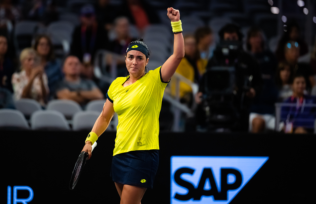 Ons Jabeur of Tunisia celebrates after converting match point against Jessica Pegula of the United States in her second round-robin group stage match during the 2022 WTA Finals, in Fort Worth, Texas, U.S., November 2, 2022. /CFP