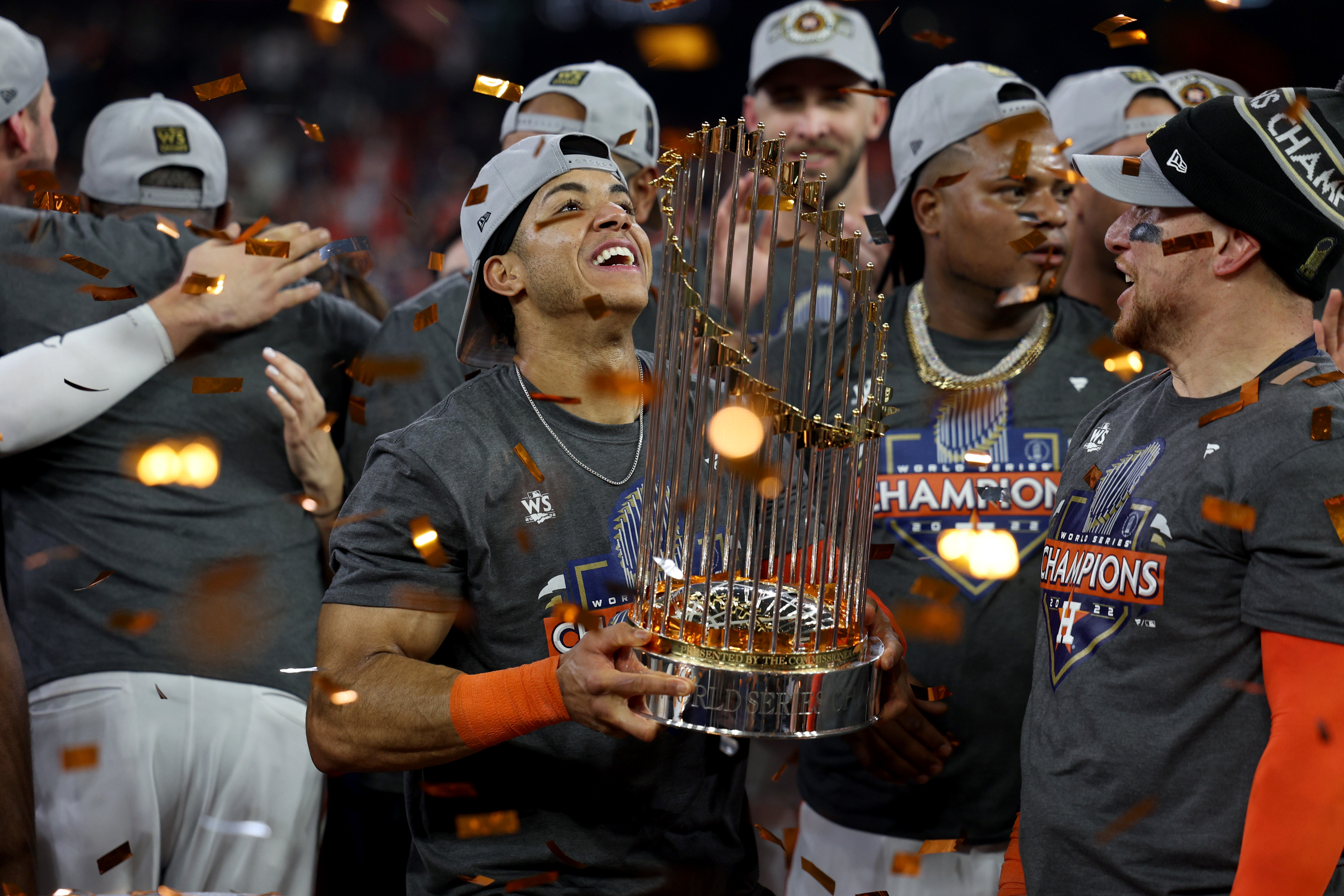 Shortstop Jeremy Pena (C) of the Houston Astros celebrates with the Commissioner's Trophy after his team beat the Philadelphia Phillies 4-1 in Game 6 of the MLB World Series at Minute Maid Park in Houston, Texas, November 5, 2022. /CFP