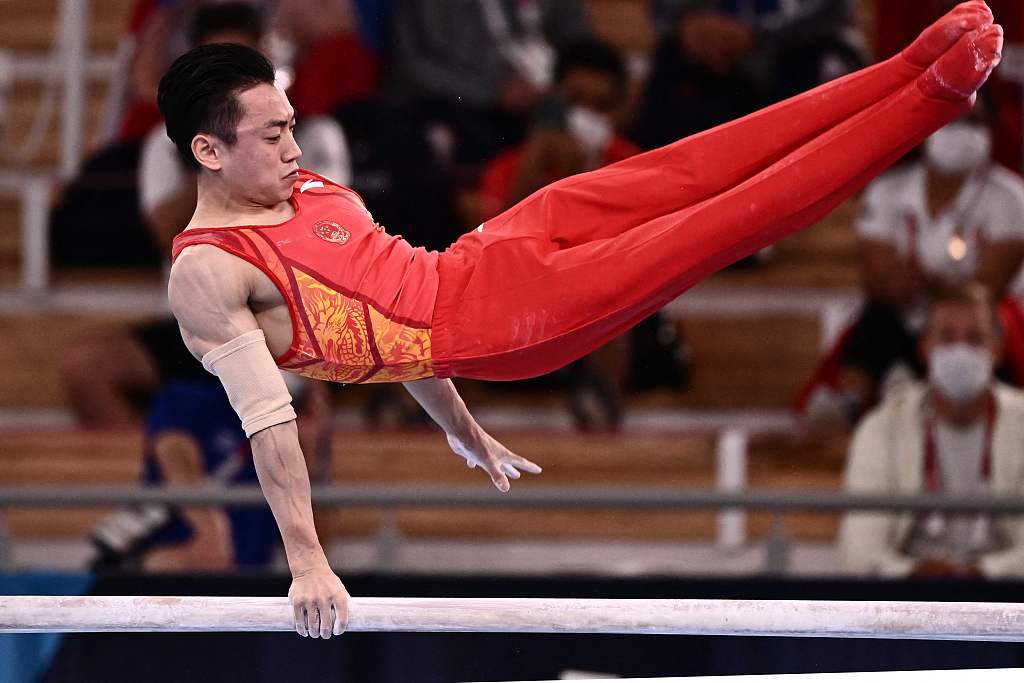 Zou Jingyuan of China performs in the men's parallel bars final at the Tokyo Olympic Games at the Ariake Gymnastics Center in Tokyo, Japan, August 3, 2021. /CFP 